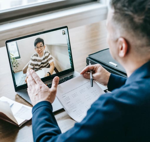 Men in meeting video conference on laptop