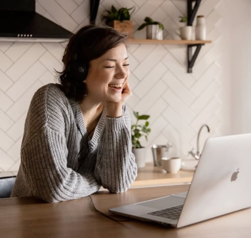 Woman in video call on laptop